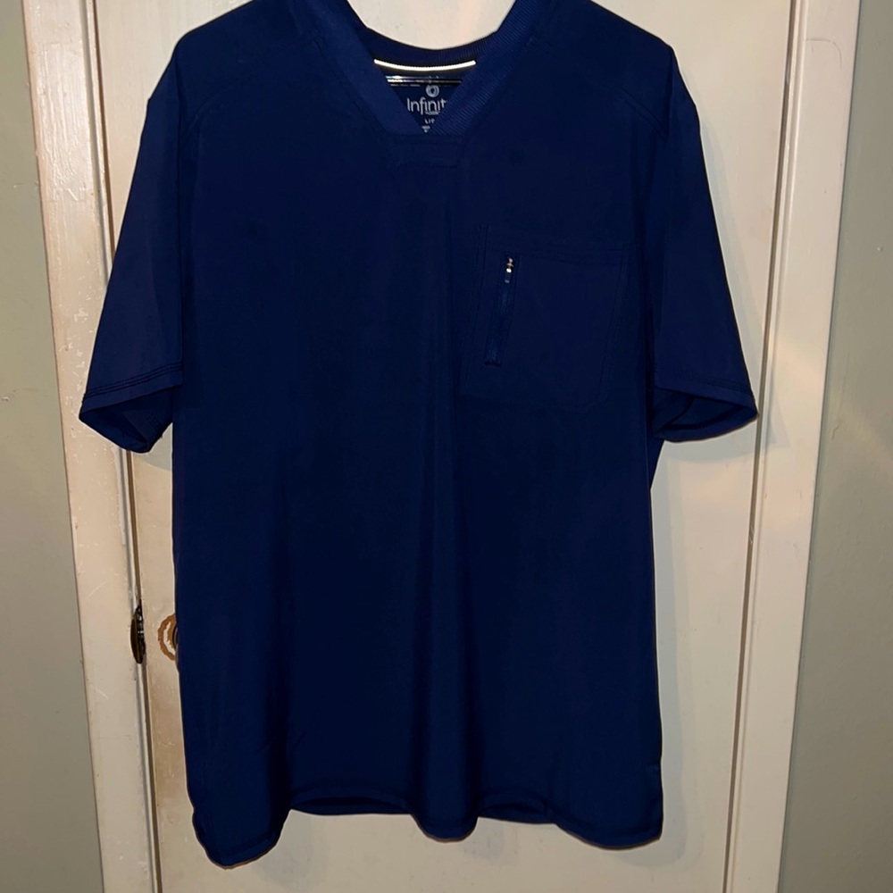 Cherokee Infinity line of Cherokee for men scrub set top and bottom.